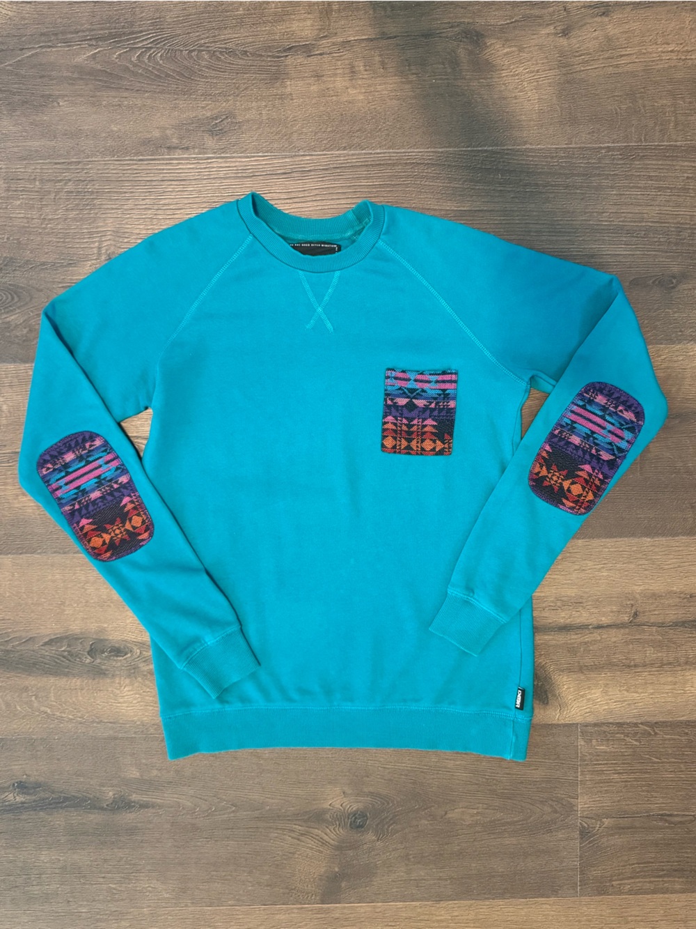 Turquoise Sweatshirt with Aztec/Patterned Patch Accents